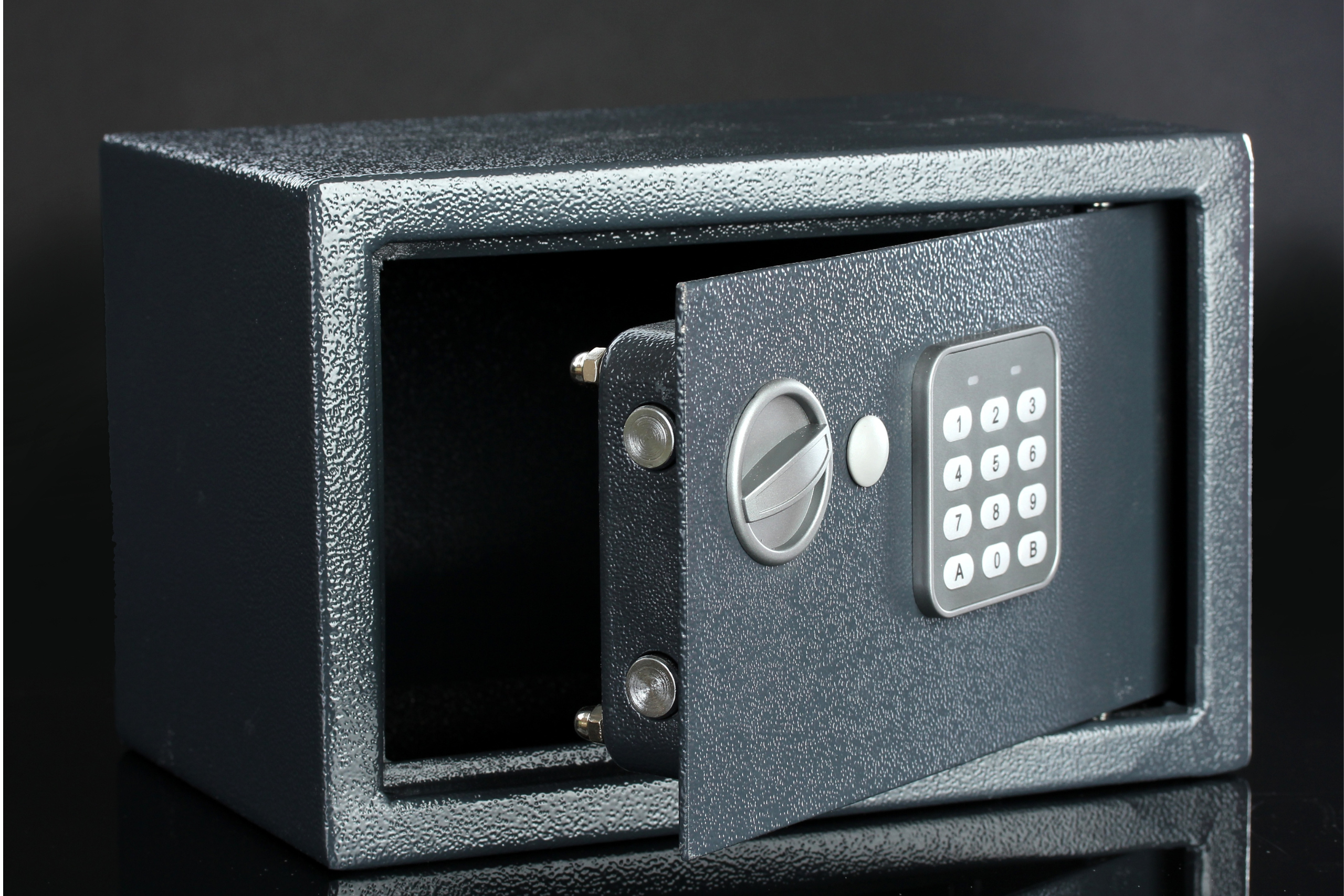 A stained oven countdown timer stainless steel adjustable knob on wooden background